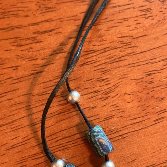 Beautiful boho style necklace with chunky blue stone cross on a leather cord. - Picture 7 of 16